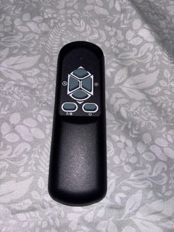 Black Remote Control with Directional Buttons