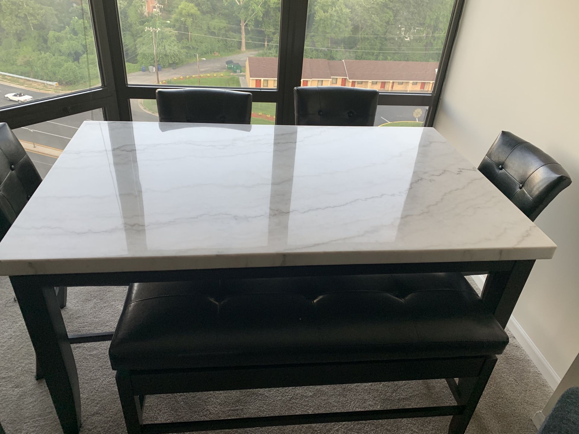 Counter height marble table with 4 chairs and 1 bench with storage