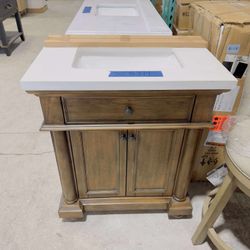 Thomasville 30 in. W x 20 in. D Bath Vanity in Walnut with Quartz Stone Vanity Top in White with White Basin $379 