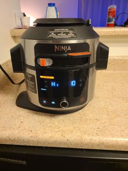 Ninja Foodi OL601 14-in-1 SmartLid Pressure Cooker Air Fryer XL