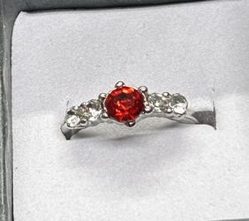 Beautifully Simple Silver Tone Ring w/ Red & Clear Stones