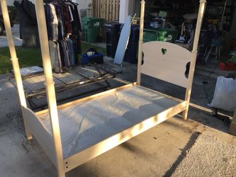 Bed (frame) with pull out bed that raises