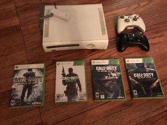 Xbox 360 with 4 call of duty games