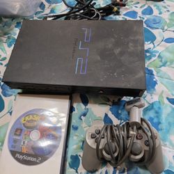 PS2 With Crash Nitrokart.   WILLING TO TRADE FOR EQUAL VALUE 