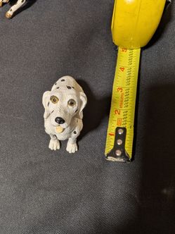 Dalmatian dog figurine with a classic black and white design.