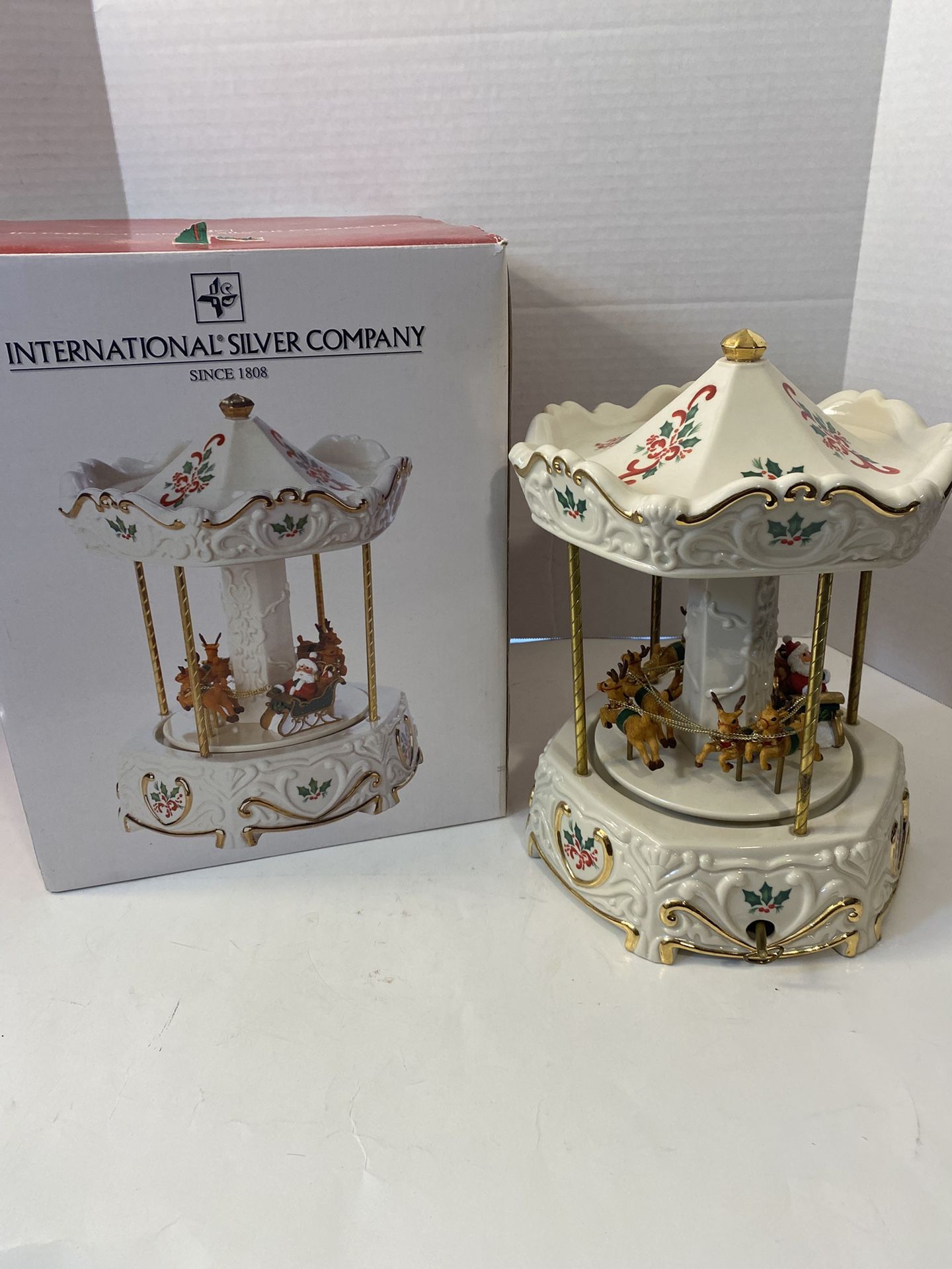 Vintage Christmas Santa, Sleigh & Reindeer Porcelain Musical Carousel; International Silver Company