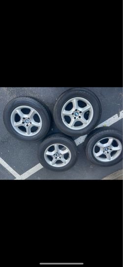 4 “BMW” RIMS/Wheels with used Continental Tires