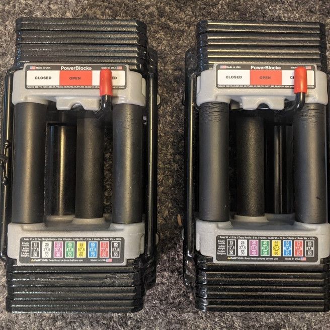 PowerBlock USA Elite (5-50 lbs) Adjustable Dumbbells with (4