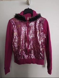 Beautiful pink sequins fox fur around Hood size extra large 14/16 for kids. Great use for any occasion. Much more clothes to select from. INQUIRE TOD