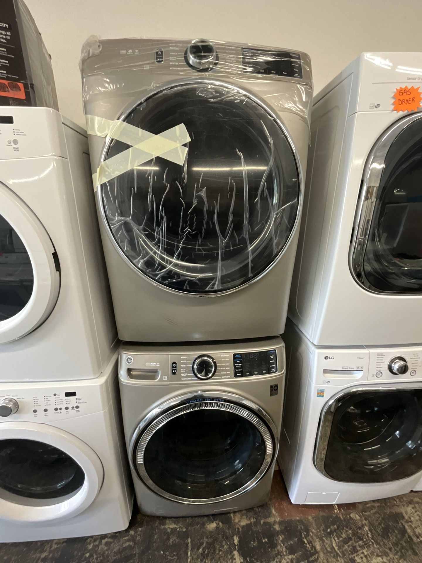 NEW GE Gas Dryer And Used GE Washer Set