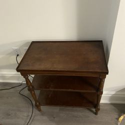 DC- old end table. slightly damaged but functional