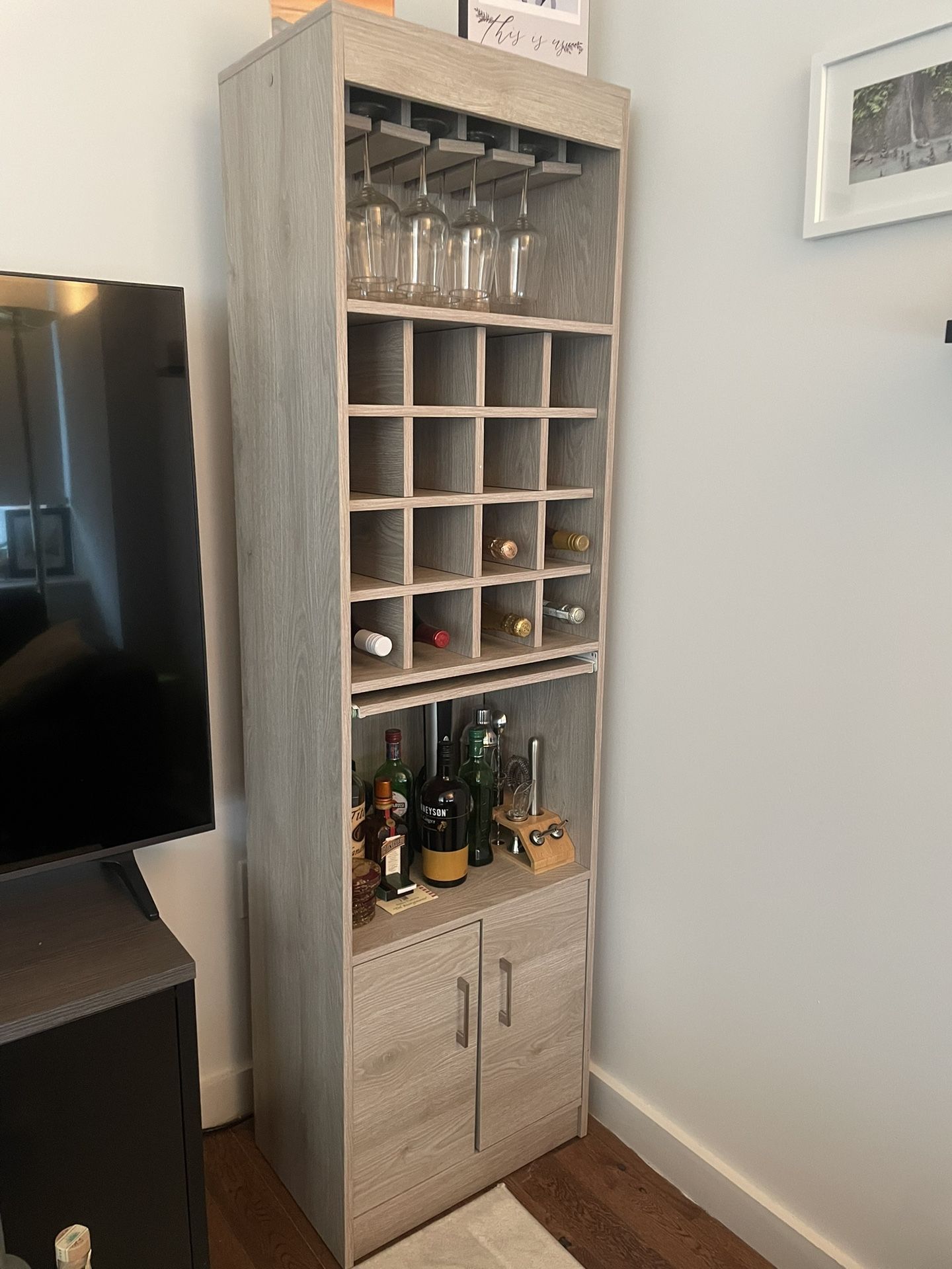 Beautiful bar cabinet with concealable tray & closed storage space