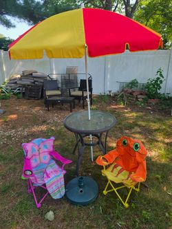 Two children's beach chair with umbrella the price is firm