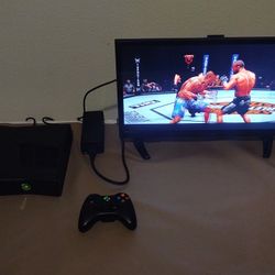 Xbox 360 Slim with Wireless Remote and UFC Game