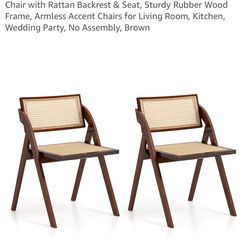 Set of 4 Wood and Rattan Folding Chairs still in box.