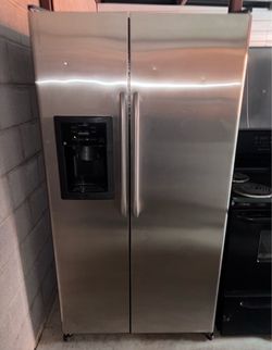 GE Stainless Steel Refrigerator And Freezer