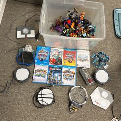 40+ skylanders figures with games and portals included