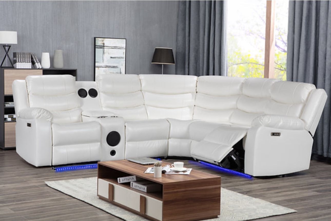 NEW WHITE POWER RECLINING SECTIONAL WITH USB PORTS AND BLUETOOTH SPEAKERS 