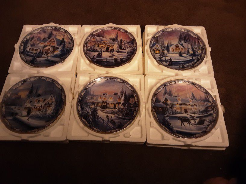 Set Of Six Bradford Exchange Christmas In The Village Collection Plates.