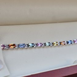 .25 Carat Diamond, And Rainbow Gemstone bracelet. White Gold 14k With Original Appraisal Document
