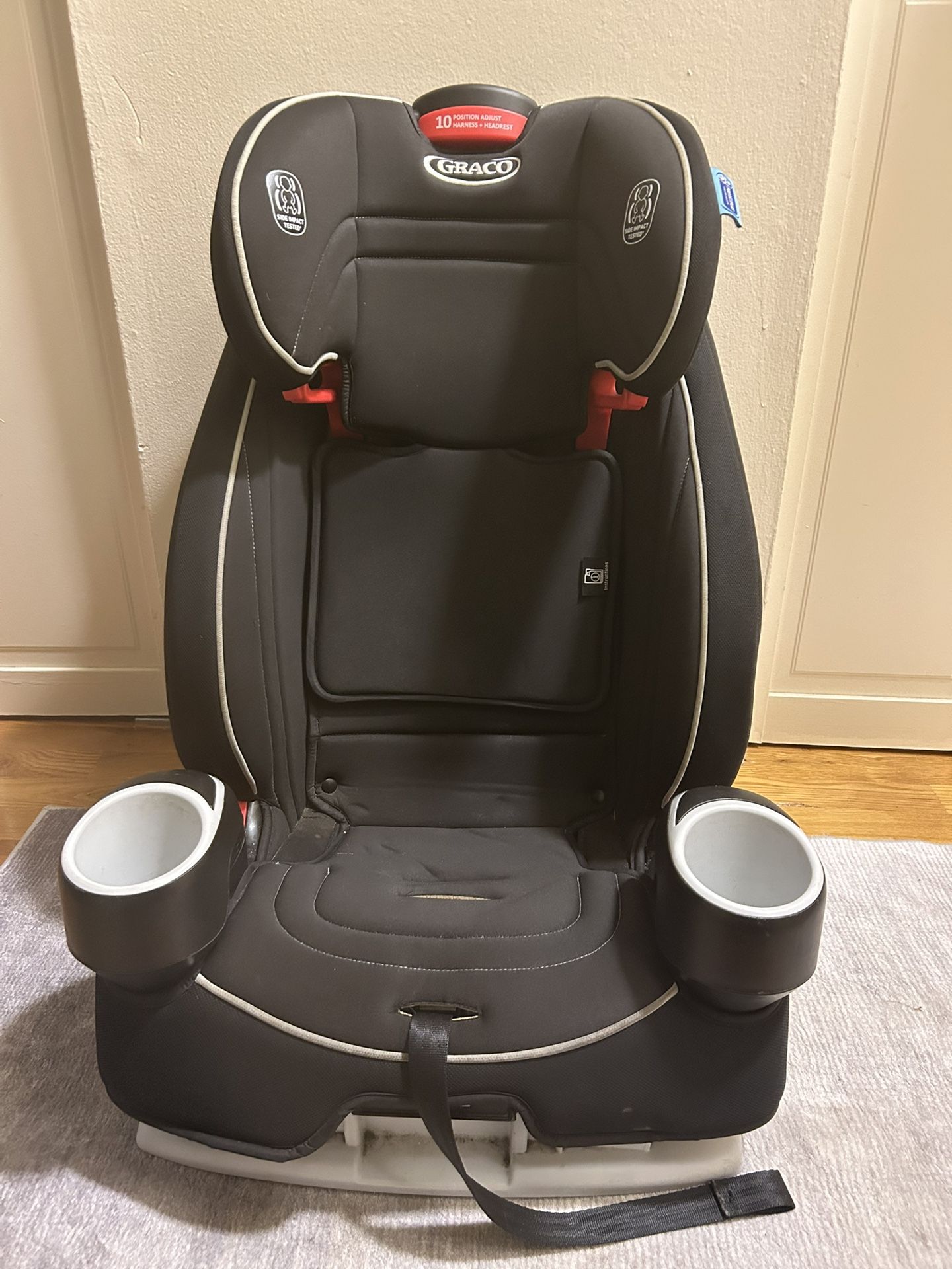 Graco Atlas 65 Car Seat: Converts from a forward-facing harness to a high-back booster seat.