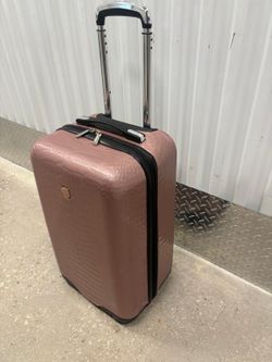 Joy Brand, hardshell  pink  luggage. Spinner 23 “ high   $40
