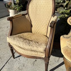 Vintage French Louis XVI-style walnut bergère armchair 
