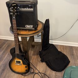 Epiphone Junior Electric Guitar tobacco burst finish single pick up design lightweight w/ Crate G10 XL amp & soft case & cord. I do not personally pla