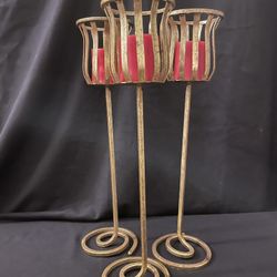 Three Gold Candle Stick Holders