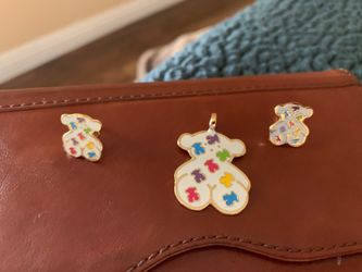 Earrings and pendant. Tous set