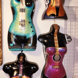 4 Guitar & Violin Mannequins $400