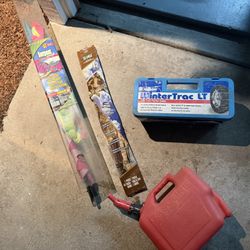 2 kites, small red gas can, WinterTrac LT Tire Chains