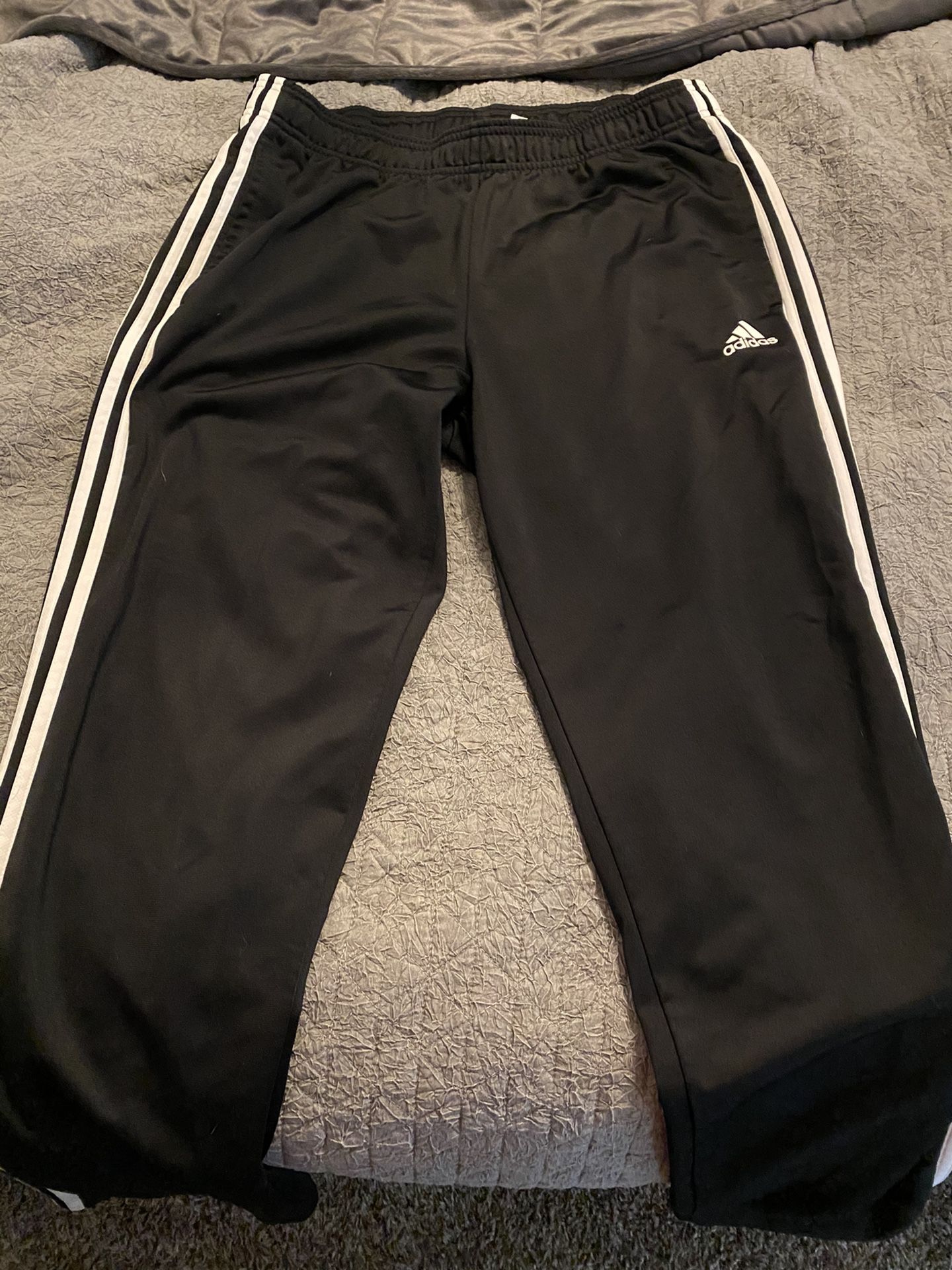 Adidas track pants size L. New condition!