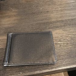 Black bill folder with side pockets for credit cards/I.D 7.00 good condition