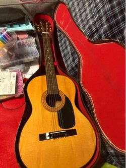 Acoustic guitar with case