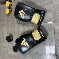 Boxing Gloves And 2 Sets Of Hand Wraps