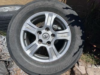Four Toyota truck mag wheels 18”
