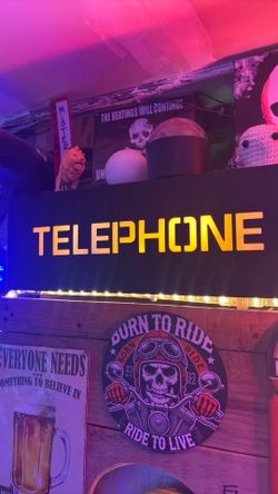 Metal box frame telephone sign
