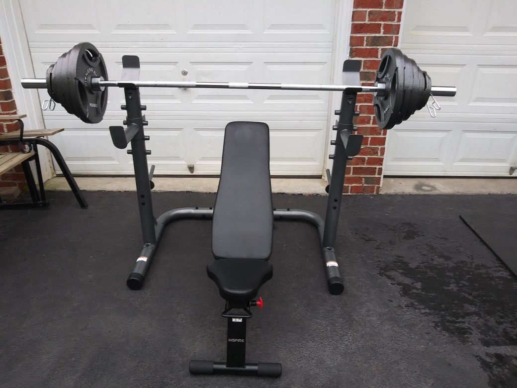 Home gym. Rack, weight set, bench.