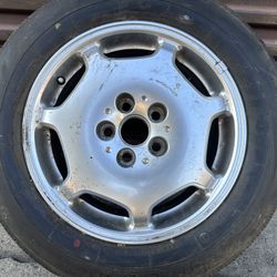 One lexus ls430 16 inch aluminum rim and old tire 