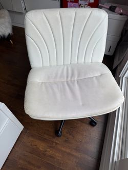 white faux leather rolling office desk chair