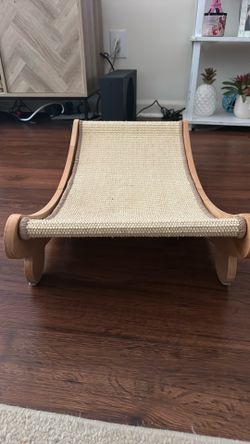 cat scratching post and small cat house