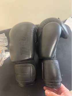 Boxing gloves, shin guards, hand wraps
