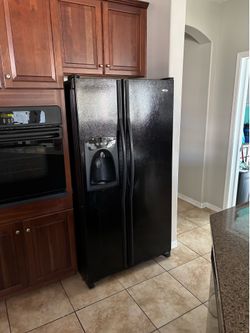 Amana side by side black refrigerator