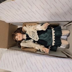 Porcelain Collectible Doll. New in box