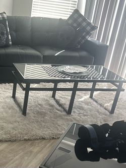 Black table with glass top