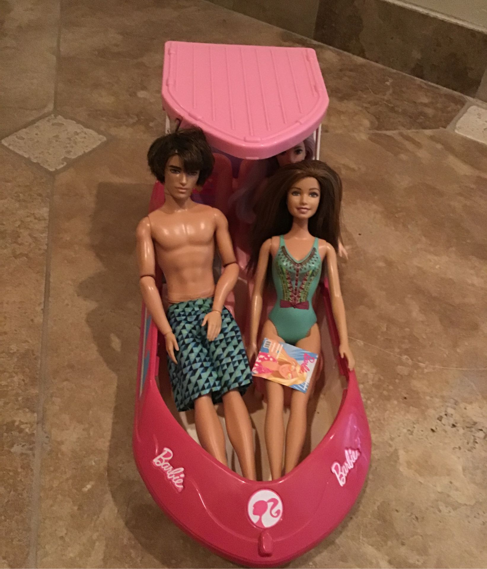 Barbie Boat and 3 Barbie Dolls