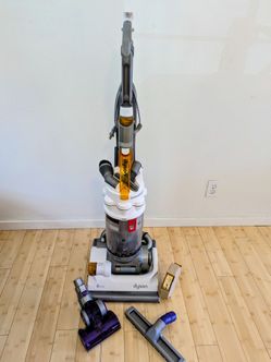 Dyson DC14 Upright Vacuum + Attachments | $100