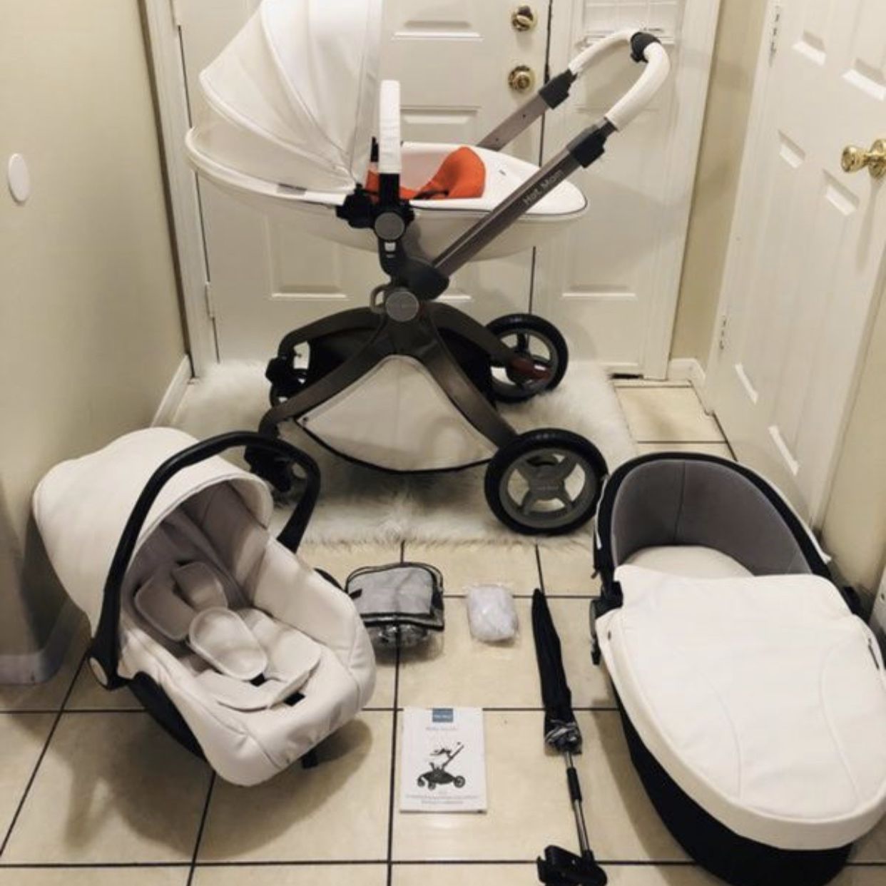 Luxury White Leather Stroller Set Including Bassinet; Car seat New Winter Cover & Umbrella 
