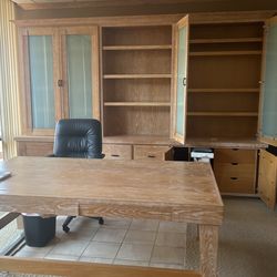 Executive custom-made fine Oakwood complete office desk with lights, spiling cabinets and a shred bin. Also included is a serving buffet or st storage